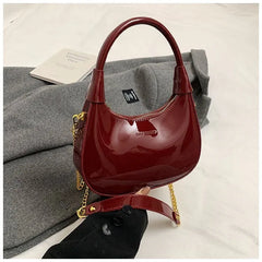 1pc Solid Color Glossy Patent PU Leather Shoulder Bag, Women's Fashion Underarm Crossbody Crescent Bag With Ancora Red Letter, Top Handle, Metal Zipper Closure, Metal Chain Shoulder Strap - Rozzlux